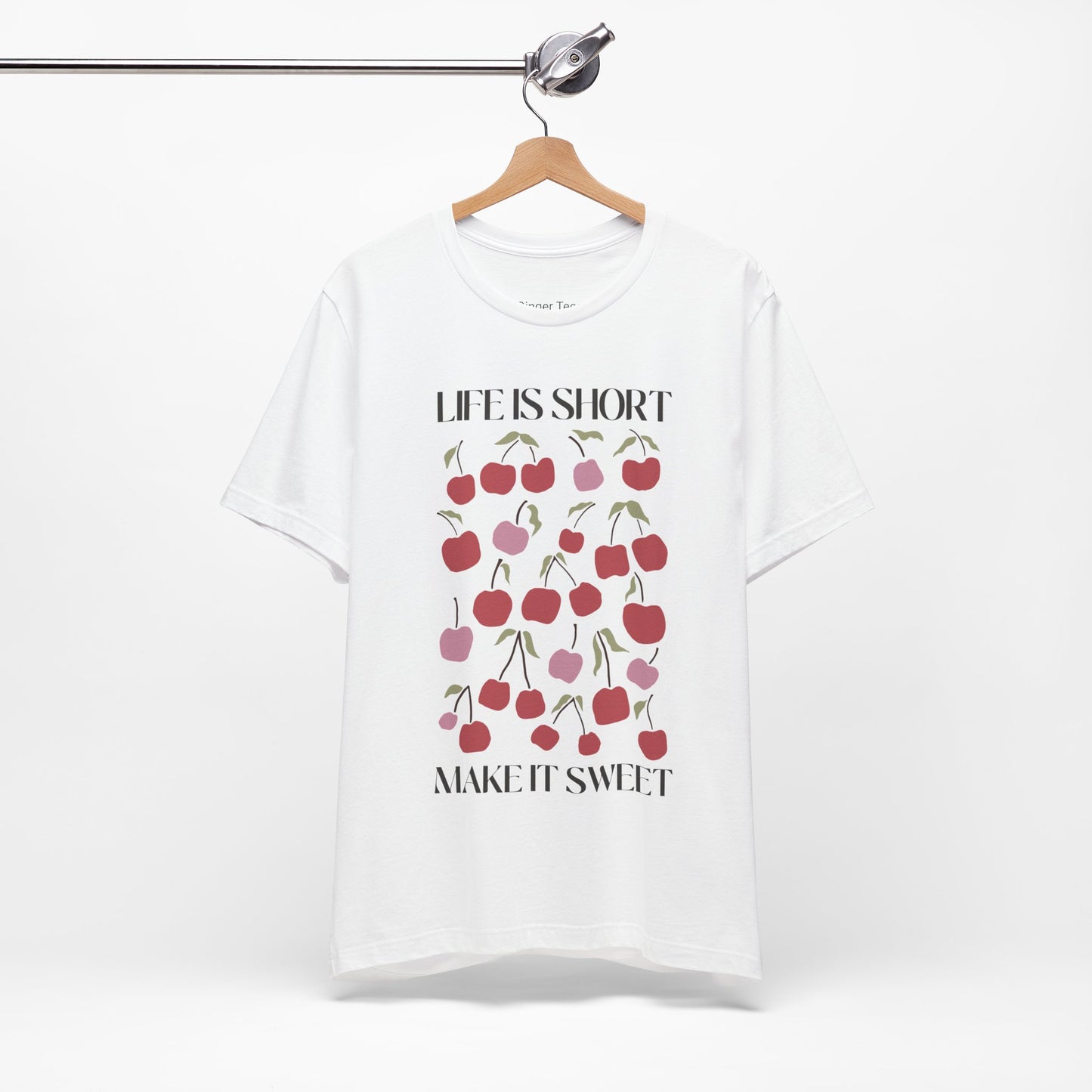 Life is Short, Make It Sweet t-shirt with cherry design, featuring playful red cherries and positive text above and below the graphic.