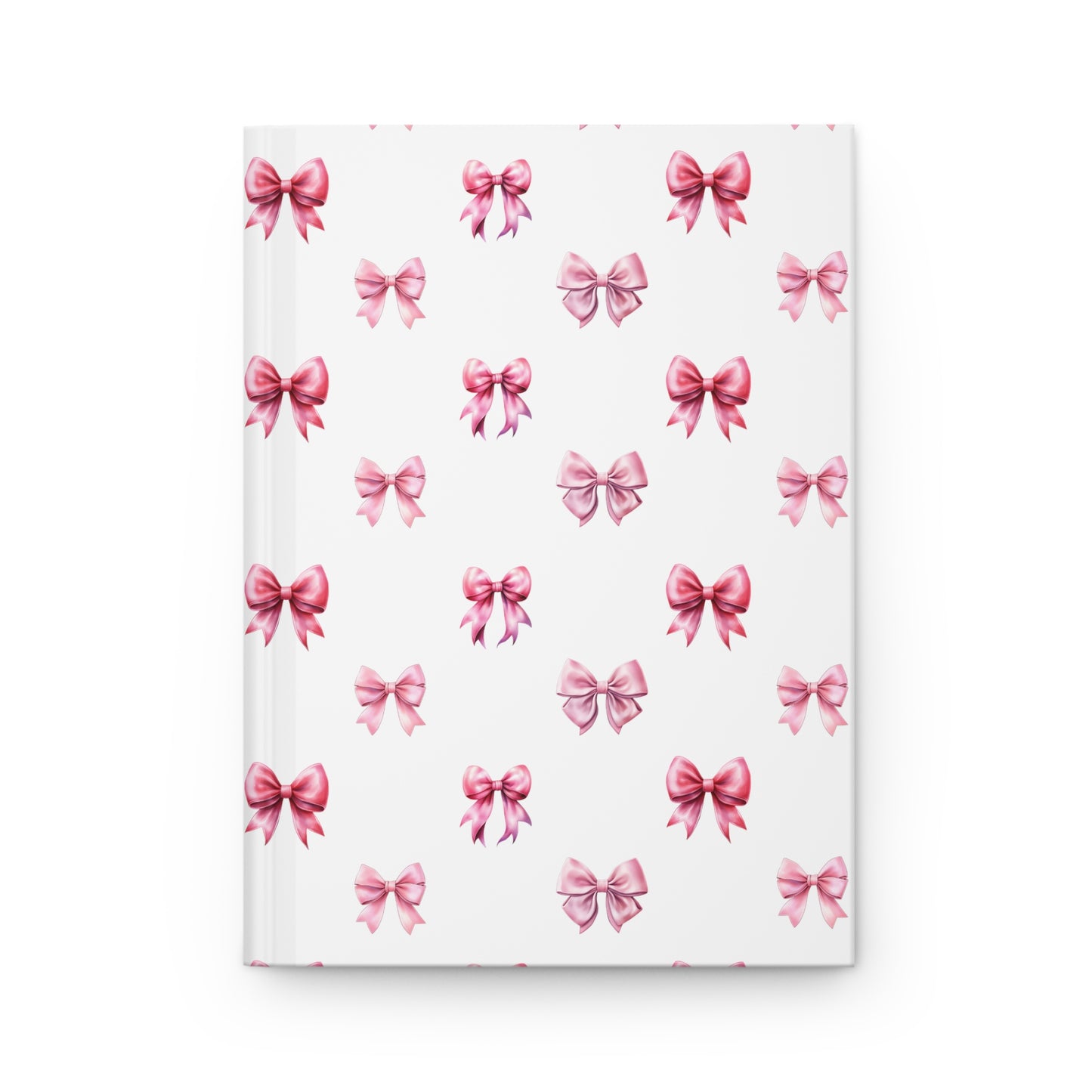 coquette pink bow pattern on hardcover lined journal. mental health and wellbeing journaling inspirational and motivational
