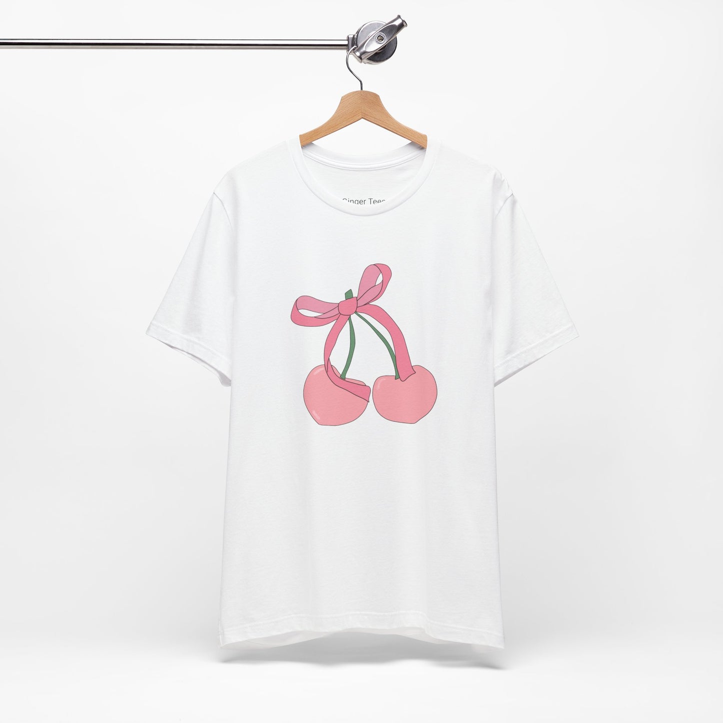 Vintage-inspired t-shirt featuring a playful cherry bow coquette design. Perfect for retro fashion enthusiasts and those who adore quirky, feminine style.