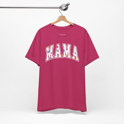 Charming Mother's Day t-shirt featuring 'Mama' in bold college-style typography with playful polka dot letters. Perfect for celebrating mom in style with a trendy and affectionate design.