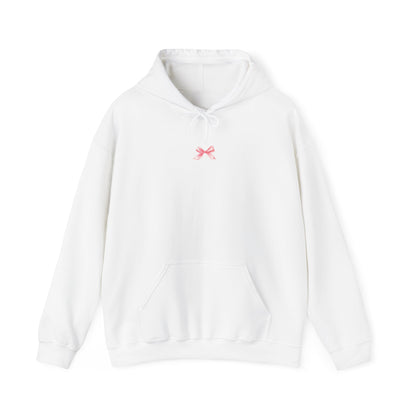 Stylish hooded sweatshirt in a coquette fashion, enhanced by a dainty pink bow embellishment.