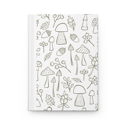 Journal cover featuring black outline illustrations of woodland plants, leaves, acorns, and berries on a clean white background for a minimalist nature-inspired design.
